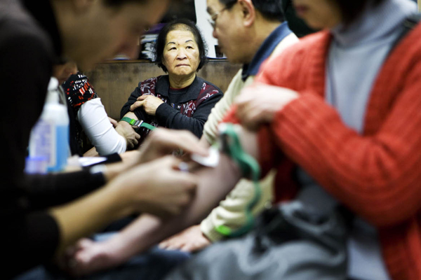 Rotterdammers van Chinese afkomst worden getest op chronische hepatitis B. Beeld: ANP Photo