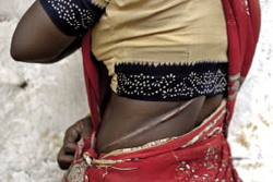 Een 32-jarige vrouw uit India verkocht haar nier om de schulden van haar gezin af te betalen. Uiteindelijk kreeg ze slechts de helft van het beloofde bedrag. Beeld: Adrian Fisk, HH